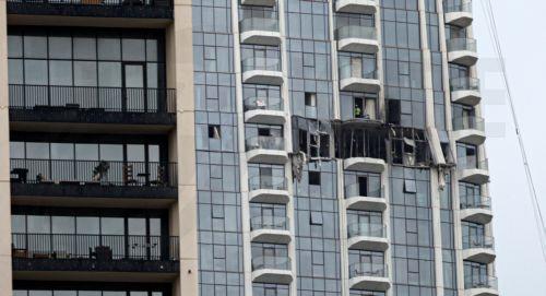 epa12814066 A view of the damaged part of the Dubai Creek Harbour Tower after it was hit by an Iranian drone attack in Dubai, United Arab Emirates, 12 March 2026.  EPA/STRINGER