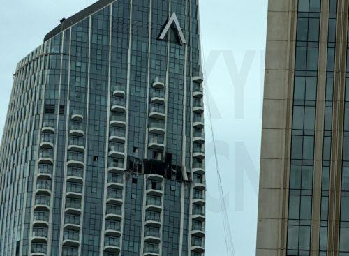 epa12814071 A view of the damaged part of the Dubai Creek Harbour Tower after it was hit by an Iranian drone attack in Dubai, United Arab Emirates, 12 March 2026.  EPA/STRINGER