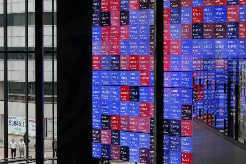 epa12816145 Passersby stand before a stock market indicator board in Tokyo, Japan, 13 March 2026. The Nikkei Stock Average continued to fall, at one point dropping more than 1,100 points from the previous day. Investors sentiment worsened following the surge of crude oil prices amid the Middle East conflict.  EPA/FRANCK ROBICHON