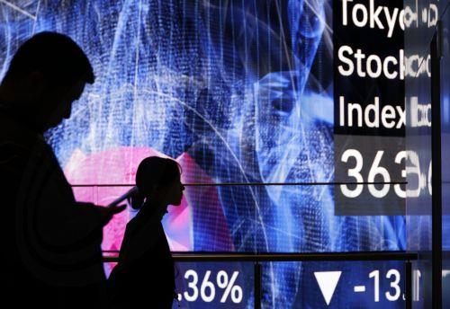 epa12816149 Employees are silhouetted before a large stock market indicator board in Tokyo, Japan, 13 March 2026. The Nikkei Stock Average continued to fall, at one point dropping more than 1,100 points from the previous day. Investors sentiment worsened following the surge of crude oil prices amid the Middle East conflict.  EPA/FRANCK ROBICHON