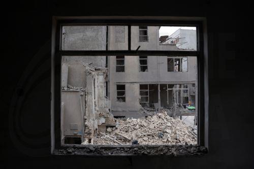 epa12821308 A damaged residential building in southern Tehran, Iran, 15 March 2026. A joint Israeli and US military operation continues to target multiple locations across Iran since the early hours of 28 February 2026.  EPA/ABEDIN TAHERKENAREH