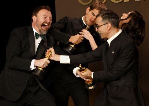 epaselect epa12823826 (L-R) Jack Piatt, Sam A. Davis, Natalie Musteata and Alexandre Singh pose with the awards for Best Live Action Short Film for 'Two People Exchanging Saliva' and 'The Singers'  during the the 98th annual Academy Awards ceremony at the Dolby Theatre in Los Angeles, California, USA, 15 March 2026.  EPA/JILL CONNELLY