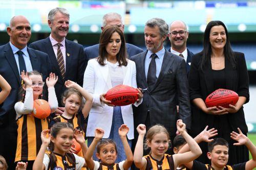 epa12826603 (L-R) MCC CEO Stuart Fox, Hawthorn Football Club President Andy Gowers, Denmark's Queen Mary, Denmark's King Frederik X, Hawthorn Football Club CEO Ashley Klein, AFL Executive General Manager, Laura Kane pose for a photograph during a visit to the MCG in Melbourne, Australia, 17 March 2026. The royal couple is visiting Australia from 14 March...